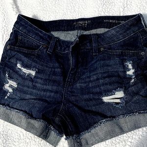 Jennifer Lopez brand shorts. Size 2 mid-rise. Medium/Dark wash, never worn.